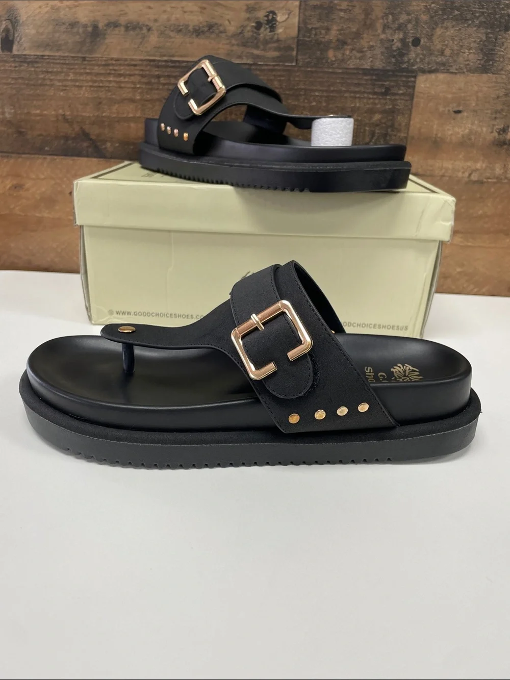 Women’s Black Thong Sandals with Gold Buckle Accent